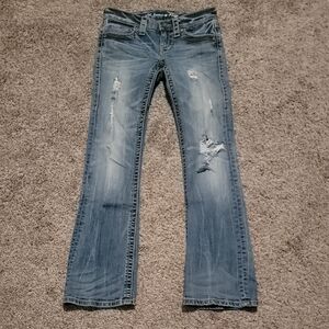 Women's Distressed Blue Jeans
